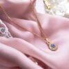 evil eye rose gold pendant